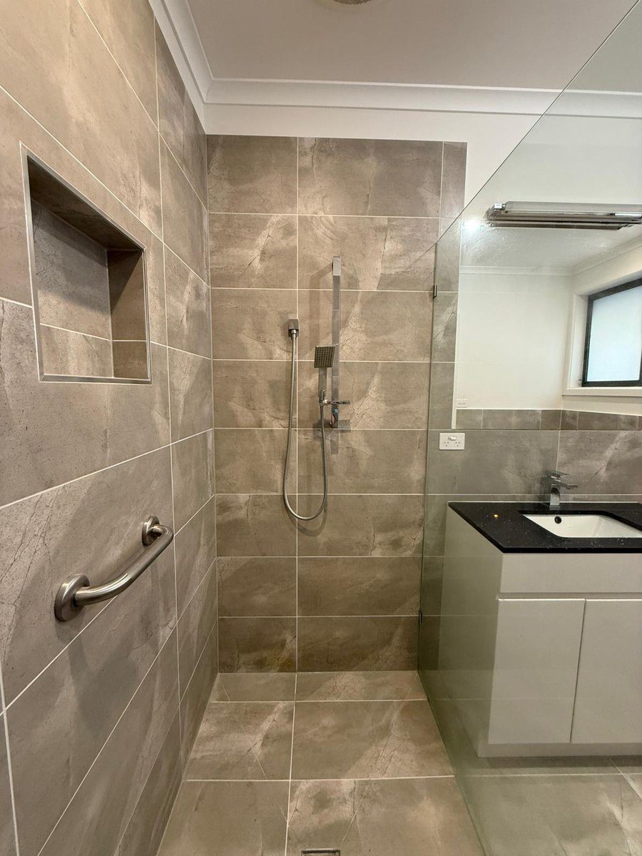 Shower wet area after epoxy regrout